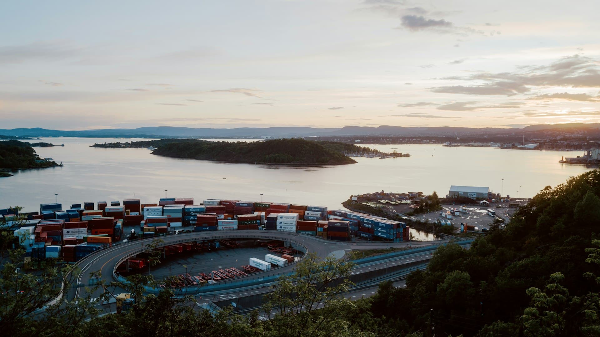 Container terminal at dusk — global logistics